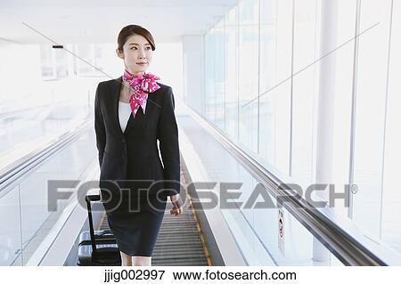 Japanese attractive flight attendant at the airport View Large Photo Image Stock Photo - Japanese attractive flight attendant at the airport. Fotosearch