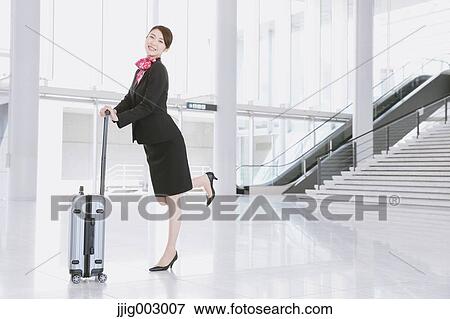 Japanese attractive flight attendant at the airport View Large Photo Image Stock Photo - Japanese attractive flight attendant at the airport. Fotosearch