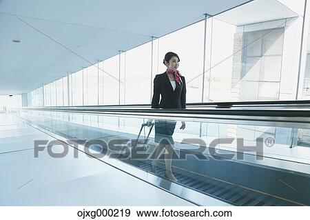 Japanese attractive flight attendant at the airport View Large Photo Image Stock Photo - Japanese attractive flight attendant at the airport. Fotosearch