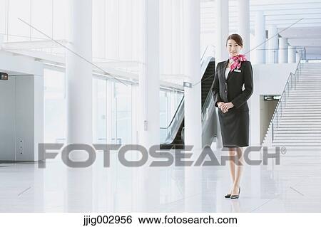 Japanese attractive flight attendant at the airport View Large Photo Image Stock Photograph - Japanese attractive flight attendant at the airport. Fotosearch