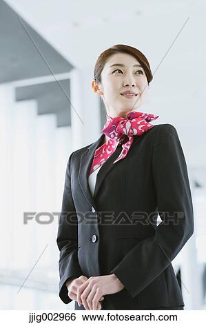 Japanese attractive flight attendant at the airport View Large Photo Image Stock Photograph - Japanese attractive flight attendant at the airport. Fotosearch