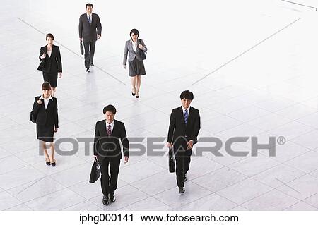 Stock Image - Japanese business people. Fotosearch