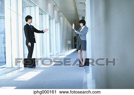 Stock Image - Japanese business people. Fotosearch