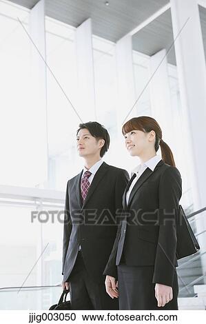 Stock Image - Japanese business people. Fotosearch