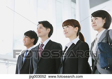 Stock Image - Japanese business people. Fotosearch