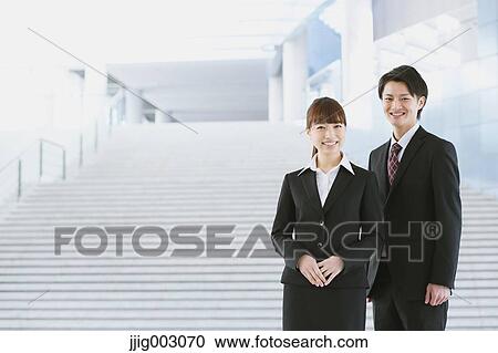 Stock Image - Japanese business people. Fotosearch
