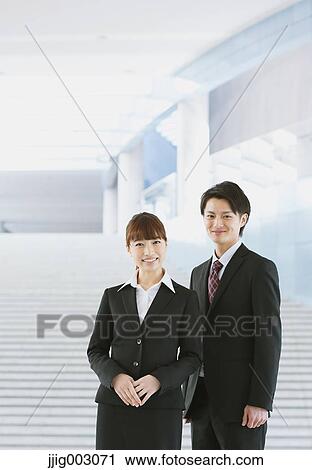 Stock Image - Japanese business people. Fotosearch