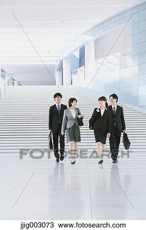 Stock Image - Japanese business people. Fotosearch