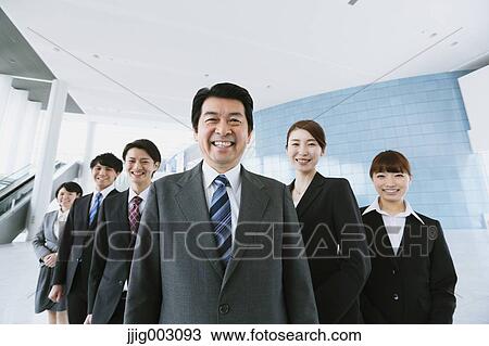 Stock Image - Japanese business people. Fotosearch