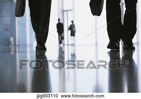 Stock Image - Japanese business people. Fotosearch