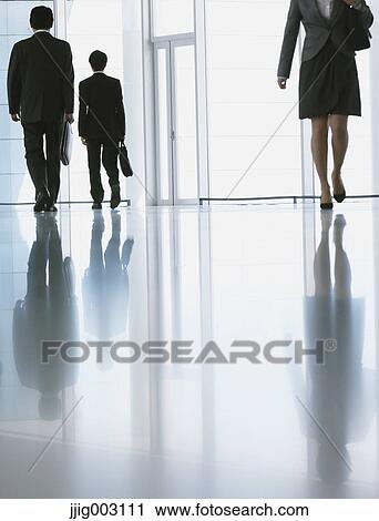 Stock Image - Japanese business people. Fotosearch