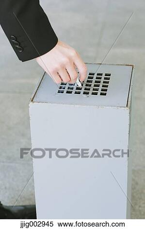Stock Photography - Japanese businessman smoking. Fotosearch