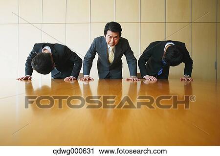 Japanese businessmen apologizing View Large Photo Image Stock Image - Japanese businessmen apologizing. Fotosearch