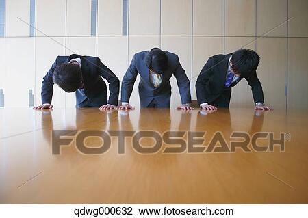 Japanese businessmen apologizing View Large Photo Image Stock Image - Japanese businessmen apologizing. Fotosearch