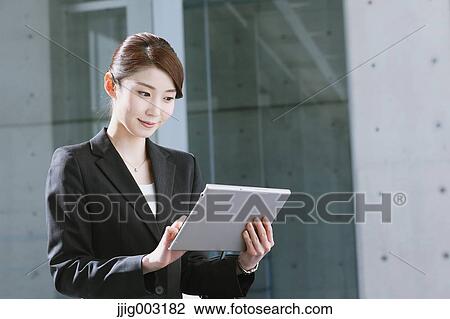 Japanese businesswoman View Large Photo Image Stock Image - Japanese businesswoman. Fotosearch