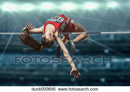 Stock Photograph - Japanese female high jump athlete jumping. Fotosearch