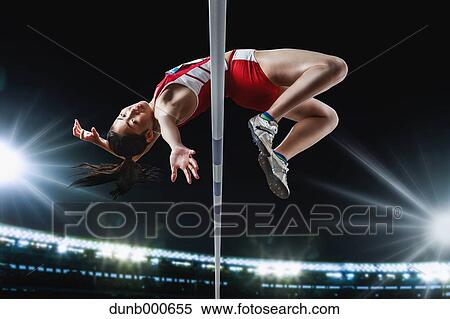 Stock Photography - Japanese female high jump athlete jumping. Fotosearch