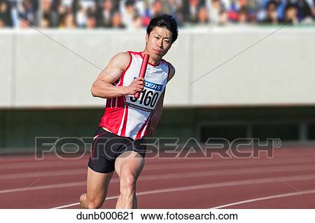 Japanese male sprinter running on track View Large Photo Image Stock Image - Japanese male sprinter running on track. Fotosearch