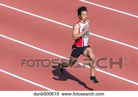 Japanese male sprinter running on track View Large Photo Image Stock Photo - Japanese male sprinter running on track. Fotosearch