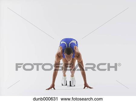 Japanese runner preparing to run View Large Photo Image Stock Image - Japanese runner preparing to run. Fotosearch