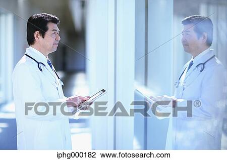Japanese senior doctor at the hospital View Large Photo Image Stock Image - Japanese senior doctor at the hospital. Fotosearch