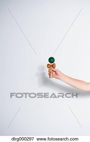 Japanese young man playing with Kendama View Large Photo Image Stock Photo - Japanese young man playing with Kendama. Fotosearch