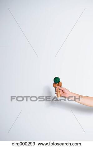 Japanese young man playing with Kendama View Large Photo Image Stock Photo - Japanese young man playing with Kendama. Fotosearch
