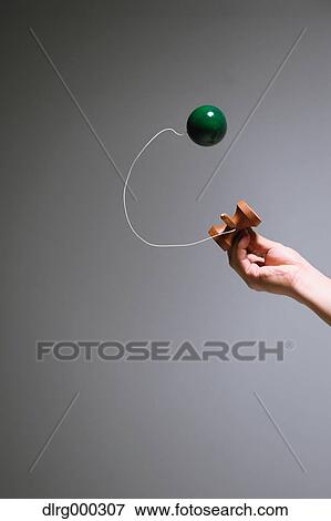 Japanese young man playing with Kendama View Large Photo Image Stock Photo - Japanese young man playing with Kendama. Fotosearch