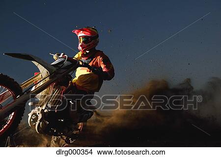 Motocross biker on dirt track View Large Photo Image Picture - Motocross biker on dirt track. Fotosearch