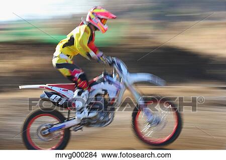 Motocross biker on dirt track View Large Photo Image Picture - Motocross biker on dirt track. Fotosearch