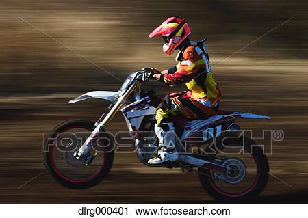 Motocross biker on dirt track View Large Photo Image Stock Image - Motocross biker on dirt track. Fotosearch