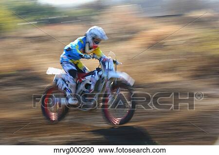 Motocross biker on dirt track View Large Photo Image Stock Image - Motocross biker on dirt track. Fotosearch