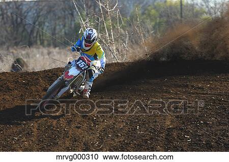 Motocross biker on dirt track View Large Photo Image Stock Image - Motocross biker on dirt track. Fotosearch
