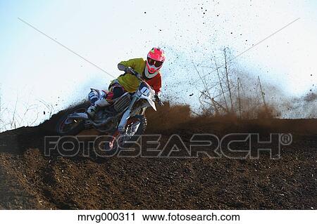 Motocross biker on dirt track View Large Photo Image Stock Image - Motocross biker on dirt track. Fotosearch