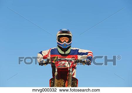 Motocross biker on dirt track View Large Photo Image Stock Image - Motocross biker on dirt track. Fotosearch