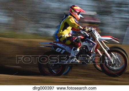 Motocross biker on dirt track View Large Photo Image Stock Photo - Motocross biker on dirt track. Fotosearch