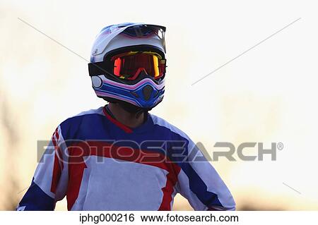 Motocross biker on dirt track View Large Photo Image Stock Photograph - Motocross biker on dirt track. Fotosearch