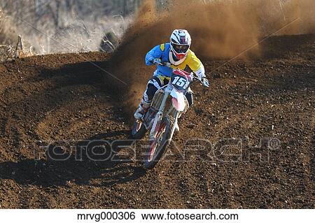 Motocross biker on dirt track View Large Photo Image Stock Photograph - Motocross biker on dirt track. Fotosearch