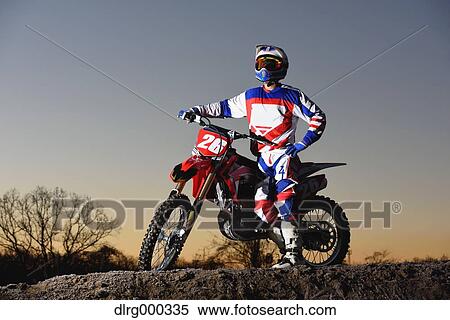 Motocross biker on dirt track View Large Photo Image Stock Photography - Motocross biker on dirt track. Fotosearch