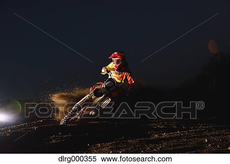 Motocross biker on dirt track View Large Photo Image Stock Photography - Motocross biker on dirt track. Fotosearch