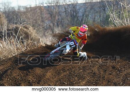 Motocross biker on dirt track View Large Photo Image Stock Photography - Motocross biker on dirt track. Fotosearch