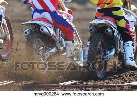 Motocross bikers on dirt track View Large Photo Image Picture - Motocross bikers on dirt track. Fotosearch