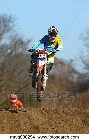 Motocross bikers on dirt track View Large Photo Image Picture - Motocross bikers on dirt track. Fotosearch