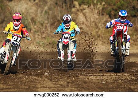 Motocross bikers on dirt track View Large Photo Image Stock Image - Motocross bikers on dirt track. Fotosearch