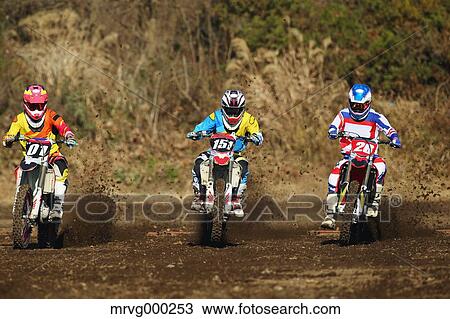 Motocross bikers on dirt track View Large Photo Image Stock Image - Motocross bikers on dirt track. Fotosearch