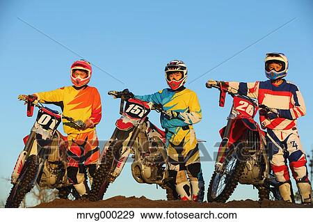 Motocross bikers on dirt track View Large Photo Image Stock Photo - Motocross bikers on dirt track. Fotosearch