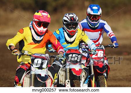 Motocross bikers on dirt track View Large Photo Image Stock Photo - Motocross bikers on dirt track. Fotosearch