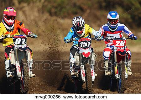 Motocross bikers on dirt track View Large Photo Image Stock Photograph - Motocross bikers on dirt track. Fotosearch