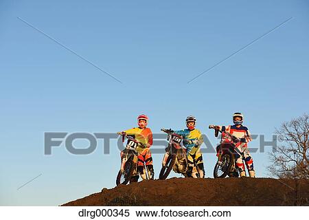 Motocross bikers on dirt track View Large Photo Image Stock Photography - Motocross bikers on dirt track. Fotosearch