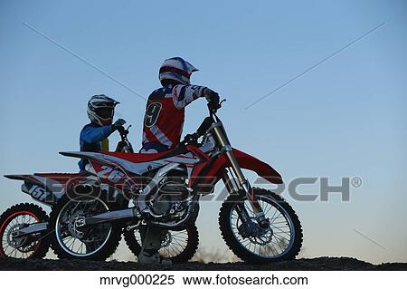 Motocross bikers on dirt track View Large Photo Image Stock Photography - Motocross bikers on dirt track. Fotosearch